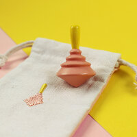 Holzkreisel gelb/rosa mit Stoffbeutel aus Baumwolle