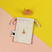 Holzkreisel gelb/rosa mit Stoffbeutel aus Baumwolle